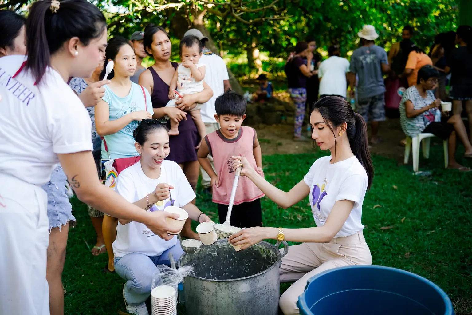Francine Marie Bautista and volunteers serving together